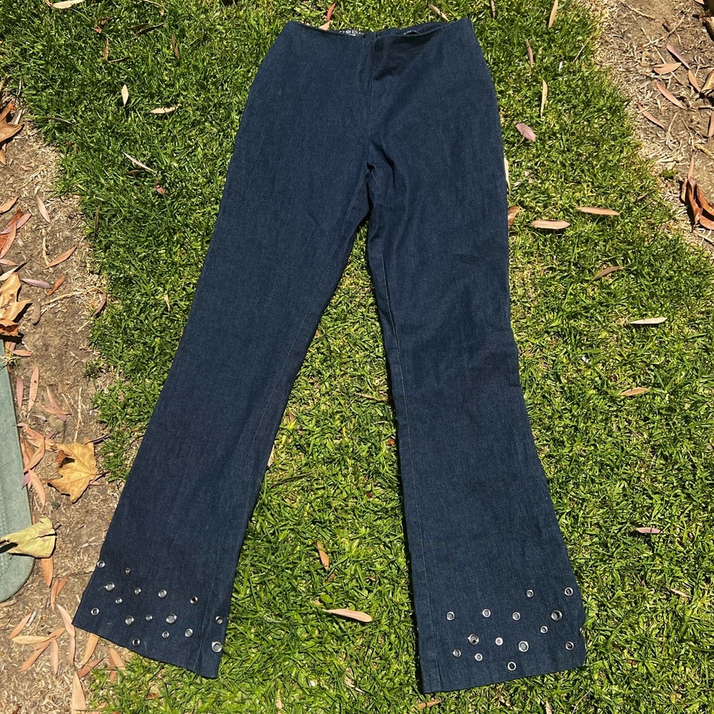 BEBE LOW WAISTED PANTS WITH SILVER DETAIL ON THE BOTTOM
